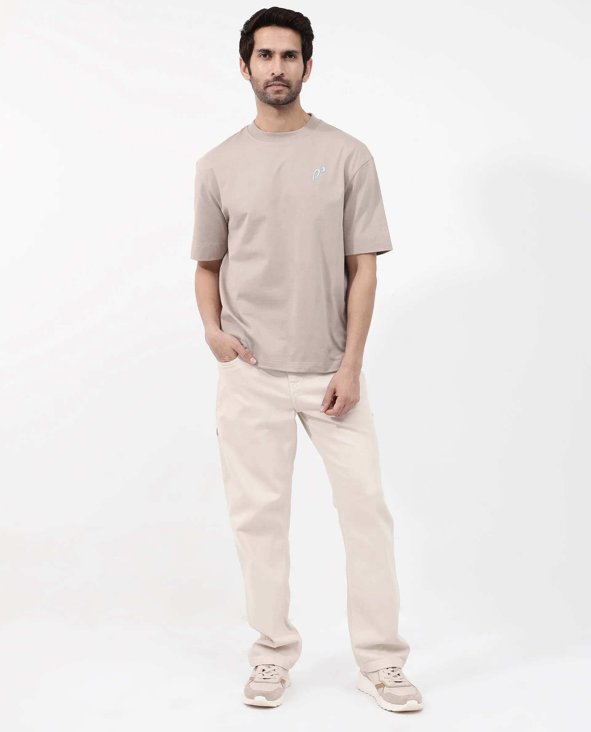 Rare Rabbit Articale Mens Quade Beige Cotton Polyester Fabric Short Sleeve Crew Neck Oversized Fit Graphic Printed T-Shirt