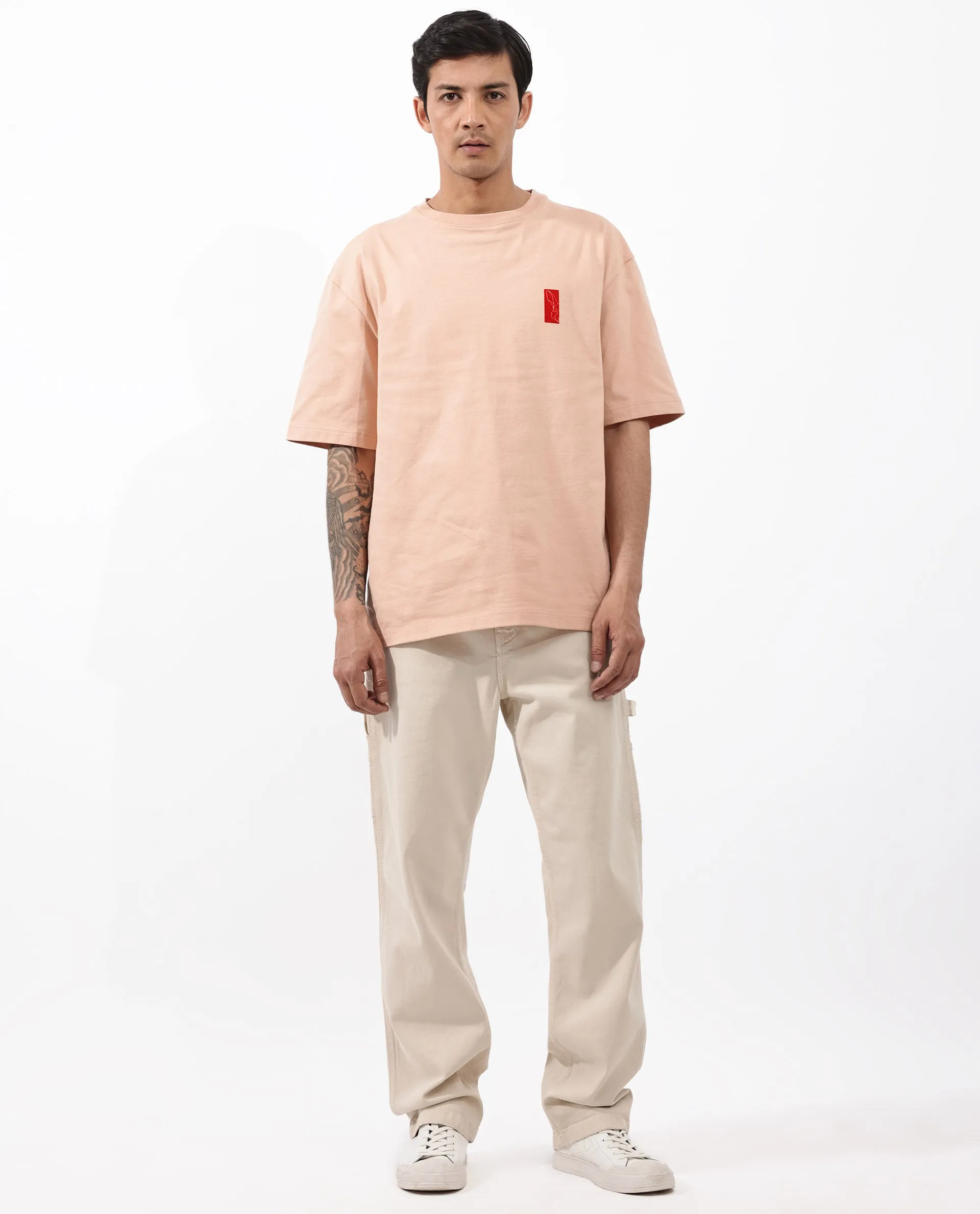 Rare Rabbit Articale Mens Vern Light Orange Cotton Polyester Fabric Short Sleeve Crew Neck Oversized Fit Printed T-Shirt